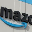 Amazon logo displayed on a building. Amazon logo displayed on a building.