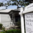 A house for lease with a sign stating "This is Why You Moved To L.A." in the foreground. A house for lease with a sign stating "This is Why You Moved To L.A." in the foreground.