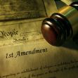 Image depicting the U.S. Constitution with a focus on the First Amendment and a gavel. Image depicting the U.S. Constitution with a focus on the First Amendment and a gavel.