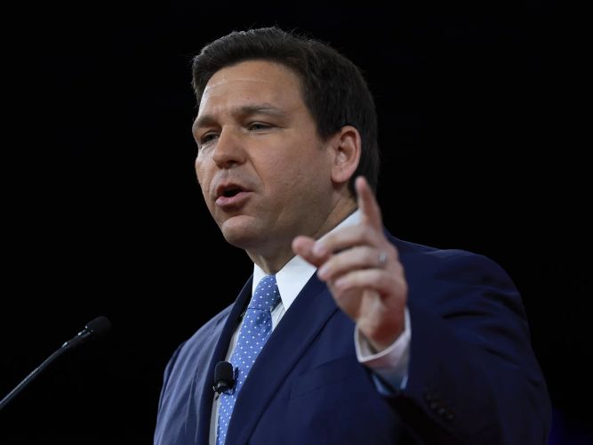 Florida Gov. Ron DeSantis, seen here on Feb. 24, signed a bill into law Monday that restricts the education of LGBTQ topics in the state's public schools. (Joe Raedle/Getty Images via NPR)