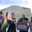 Protesters holding signs advocating against conversion therapy for minors outside the Supreme Court. Protesters holding signs advocating against conversion therapy for minors outside the Supreme Court.