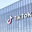TikTok building exterior with the company logo displayed prominently. TikTok building exterior with the company logo displayed prominently.