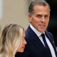 Hunter Biden, with a woman beside him, observed outside a courthouse following his conviction for lying to purchase a firearm. Hunter Biden, with a woman beside him, observed outside a courthouse following his conviction for lying to purchase a firearm.