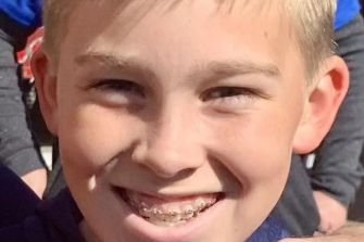 A smiling teenage boy with braces, representing the victim of a fatal car crash at a Chicago car wash.