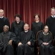The current justices of the United States Supreme Court posing for an official group photograph. The current justices of the United States Supreme Court posing for an official group photograph.