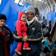 Asylum seekers wait in a shelter, demonstrating the impact of immigration policies on families and individuals seeking refuge. Asylum seekers wait in a shelter, demonstrating the impact of immigration policies on families and individuals seeking refuge.