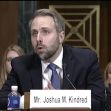 Mr. Joshua M. Kindred speaking at a Senate hearing. Mr. Joshua M. Kindred speaking at a Senate hearing.