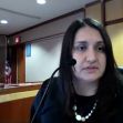 A courtroom scene featuring Judge Kristela Cervera during a virtual hearing related to a homicide case involving a ten-year-old boy. A courtroom scene featuring Judge Kristela Cervera during a virtual hearing related to a homicide case involving a ten-year-old boy.