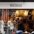 Brandy Melville store front displaying apparel and branding. Brandy Melville store front displaying apparel and branding.