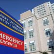 Sign for Emory University Hospital Midtown, indicating the emergency department. Sign for Emory University Hospital Midtown, indicating the emergency department.