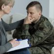 A U.S. Army veteran receives support during a counseling session, highlighting the impact of PTSD on his life. A U.S. Army veteran receives support during a counseling session, highlighting the impact of PTSD on his life.