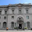 Exterior view of the Ninth Circuit Court of Appeals building in San Francisco, California, with people walking in front. Exterior view of the Ninth Circuit Court of Appeals building in San Francisco, California, with people walking in front.