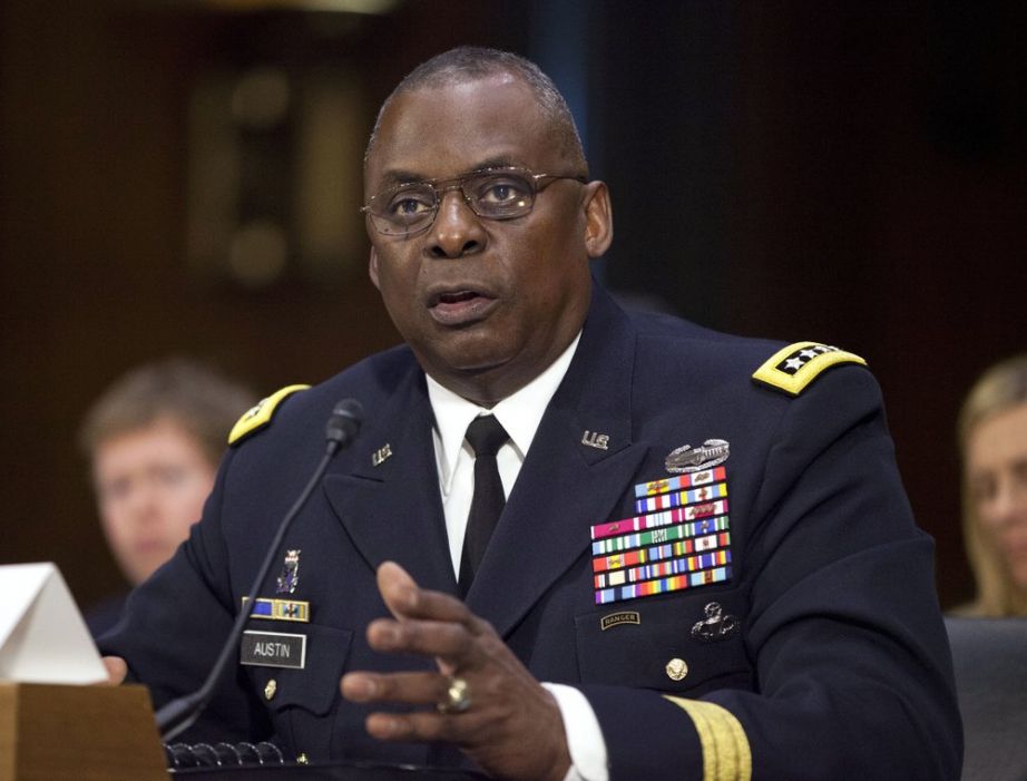 In this Sept. 16, 2015, photo, U.S. Central Command Commander Gen. Lloyd Austin III, testifies on Capitol Hill in Washington. Biden will nominate retired four-star Army general Lloyd J. Austin to be secretary of defense. That's according to three people familiar with the decision who spoke on condition of anonymity because the selection hadn't been formally announced. (AP Photo/Pablo Martinez Monsivais, File)