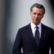 Governor Gavin Newsom speaking on a political issue, with a serious expression. Governor Gavin Newsom speaking on a political issue, with a serious expression.