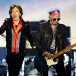 Mick Jagger and Keith Richards performing on stage. Mick Jagger and Keith Richards performing on stage.