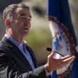 Virginia Governor Ralph Northam speaking during a press event, with the Virginia state flag in the background. Virginia Governor Ralph Northam speaking during a press event, with the Virginia state flag in the background.