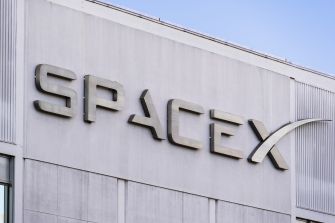 Signage of the SpaceX building with the company logo prominently displayed.