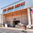 Home Depot store exterior with signs and products displayed outside. Home Depot store exterior with signs and products displayed outside.