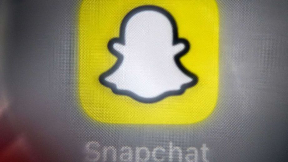 The logo of the social network and messaging app Snapchat on a smartphone screen. (Kirill Kudryavtsev/AFP via Getty Images)