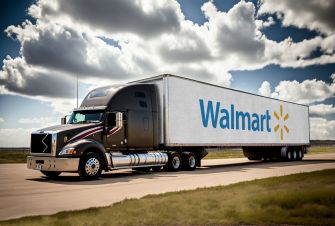 Walmart truck on a highway with the company's logo displayed prominently on the trailer.