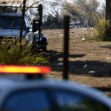 Scene of an outdoor concert venue in Dallas, showing debris and police vehicles after a shooting incident. Scene of an outdoor concert venue in Dallas, showing debris and police vehicles after a shooting incident.