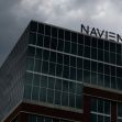 Building with "NAVIENT" sign against a stormy sky. Building with "NAVIENT" sign against a stormy sky.