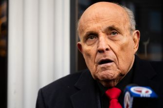 Rudy Giuliani speaking during a public appearance.