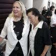 Image of women in an emotional moment, possibly related to a court ruling or verdict. Image of women in an emotional moment, possibly related to a court ruling or verdict.