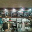 Menu board and kitchen area of Taqueria Garibaldi, a California-based taqueria. Menu board and kitchen area of Taqueria Garibaldi, a California-based taqueria.