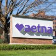 Aetna sign outside a corporate office building. Aetna sign outside a corporate office building.