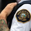 Portland Police Bureau patch on an officer's uniform. Portland Police Bureau patch on an officer's uniform.