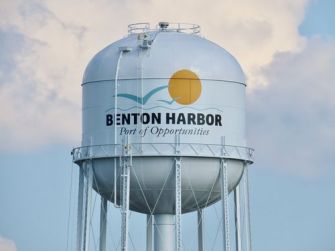 Water tower in Benton Harbor, Michigan, featuring the town's name and slogan.