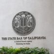 The seal of the State Bar of California displayed on a building wall. The seal of the State Bar of California displayed on a building wall.