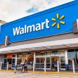 Exterior view of a Walmart store with customers entering and leaving. Exterior view of a Walmart store with customers entering and leaving.
