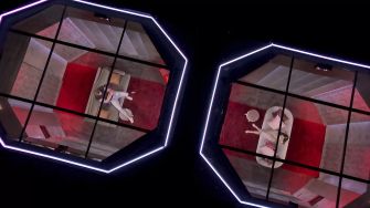 Two contestants interacting in individual pods on the reality show 'Love Is Blind.'