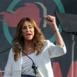 Caitlyn Jenner speaking at a podium during her campaign for governor of California. Caitlyn Jenner speaking at a podium during her campaign for governor of California.