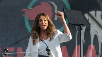 Caitlyn Jenner speaking at a podium during her campaign for governor of California.