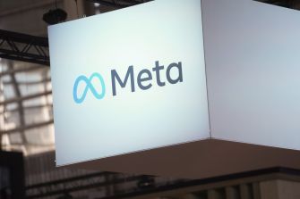 Logo of Meta Platforms, Inc. displayed at an event, representing the company formerly known as Facebook.