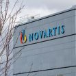 Building with the Novartis logo, highlighting the pharmaceutical company's recent legal issues. Building with the Novartis logo, highlighting the pharmaceutical company's recent legal issues.