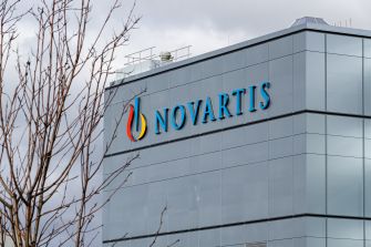 Building with the Novartis logo, highlighting the pharmaceutical company's recent legal issues.