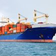 Cargo ship loaded with containers at sea. Cargo ship loaded with containers at sea.