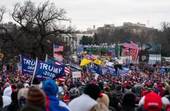 A large crowd of supporters holding flags and signs at the "Save America Rally" in front of the White House on January 6, 2021, prior to the Capitol riot.