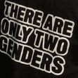 A close-up of a black t-shirt featuring the text "THERE ARE ONLY TWO GENDERS" in bold white letters. A close-up of a black t-shirt featuring the text "THERE ARE ONLY TWO GENDERS" in bold white letters.