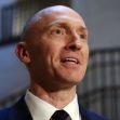 Carter Page, a former Trump campaign adviser, speaking in an official setting. Carter Page, a former Trump campaign adviser, speaking in an official setting.