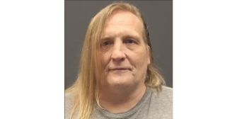 Mugshot of a transgender woman, Christina Lusk, who is suing the Minnesota Department of Corrections for being housed in a men's facility.