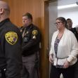 Jennifer Crumbley, mother of school shooter Ethan Crumbley, entering a courtroom surrounded by law enforcement after being found guilty of involuntary manslaughter. Jennifer Crumbley, mother of school shooter Ethan Crumbley, entering a courtroom surrounded by law enforcement after being found guilty of involuntary manslaughter.
