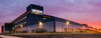 Amazon distribution center at sunset.