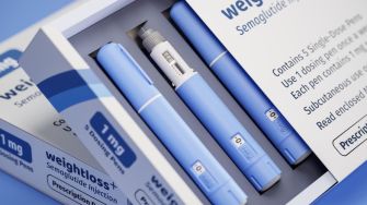 Image of a box containing weight-loss medication pens, specifically semaglutide injections, used for obesity treatment.
