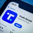 Screenshot of the Truth Social app on a smartphone displaying its interface and ratings. Screenshot of the Truth Social app on a smartphone displaying its interface and ratings.