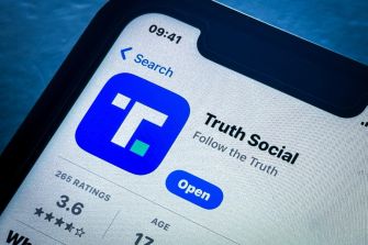 Screenshot of the Truth Social app on a smartphone displaying its interface and ratings.